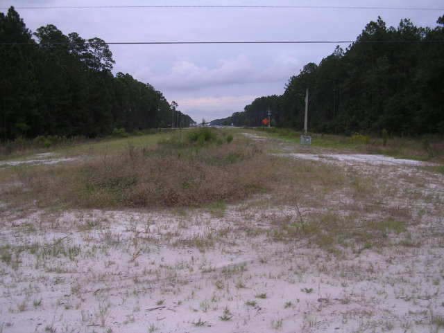 Looking East down old 103rd roadbed toward the new entrance